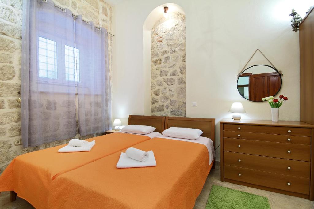 Posteľ alebo postele v izbe v ubytovaní Apartman Nikola