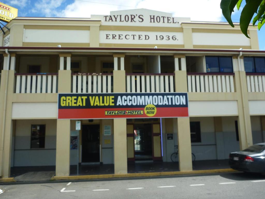 a building with a sign on the front of it at Taylors Hotel in Mackay