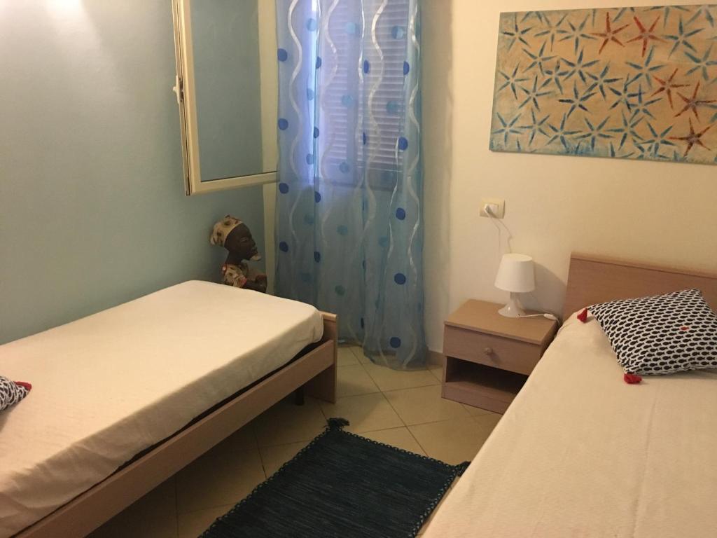 Postel nebo postele na pokoji v ubytování SAL at HOME