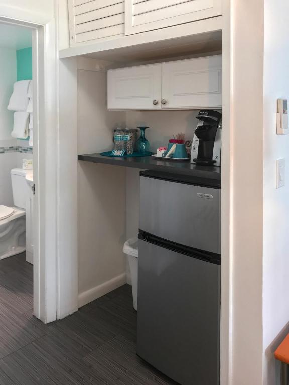 Kuchyň nebo kuchyňský kout v ubytování Nobleton Hotel