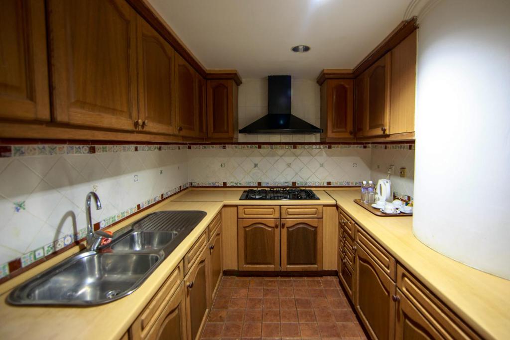 Kuchyň nebo kuchyňský kout v ubytování Beta Service Apartment
