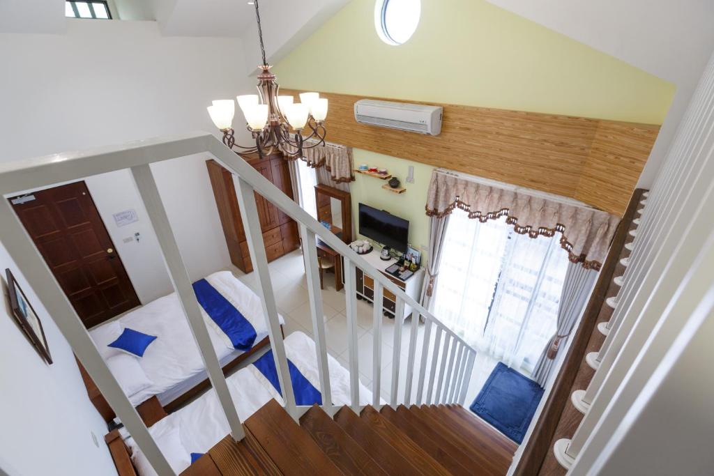 Postel nebo postele na pokoji v ubytování YiShan Farm Homestay