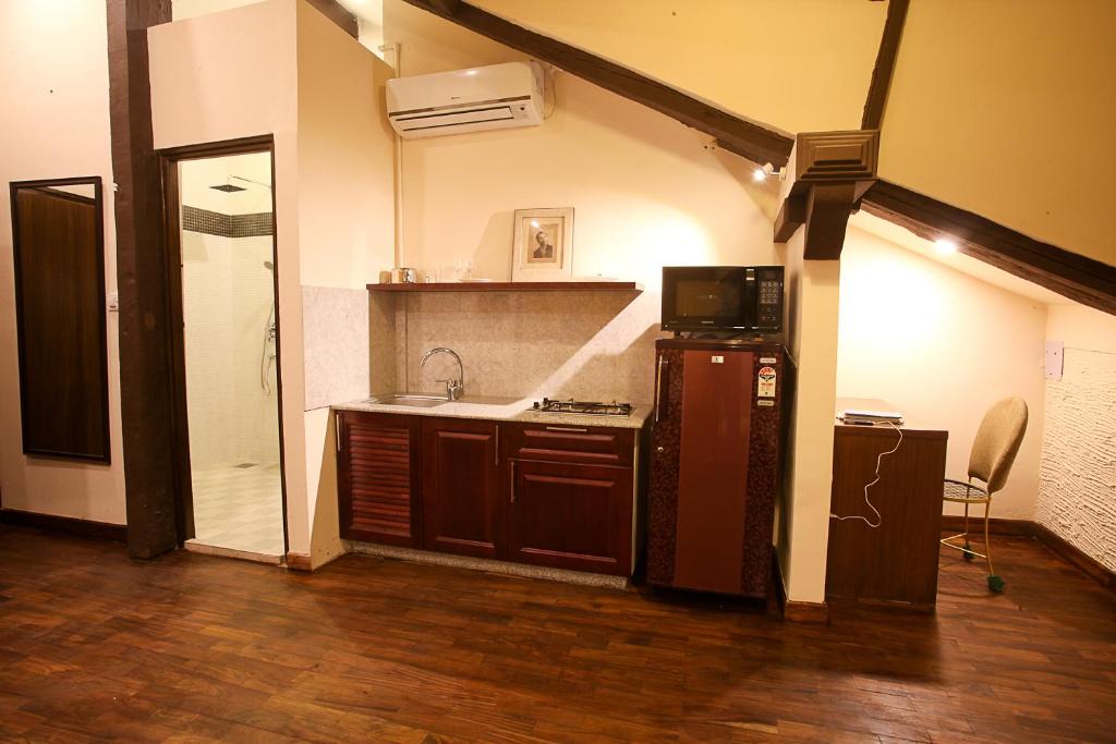 Kuchyň nebo kuchyňský kout v ubytování Hotel Heranya