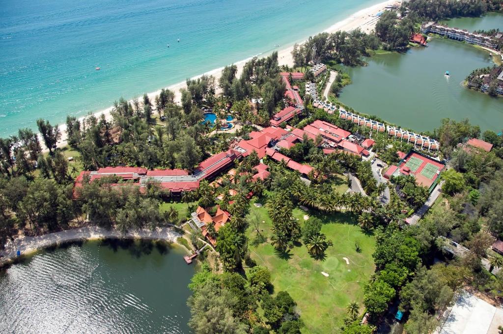 an aerial view of a house on a island in the water at Dusit Thani Laguna Phuket in Bang Tao Beach