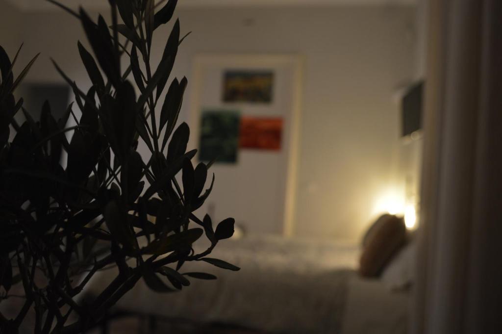Łóżko lub łóżka w pokoju w obiekcie Bed, Book & Breakfast Landolina