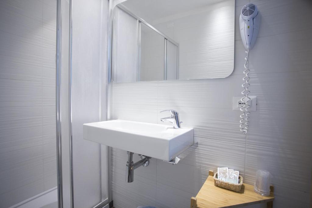 Koupelna v ubytování Hotel Excelsior