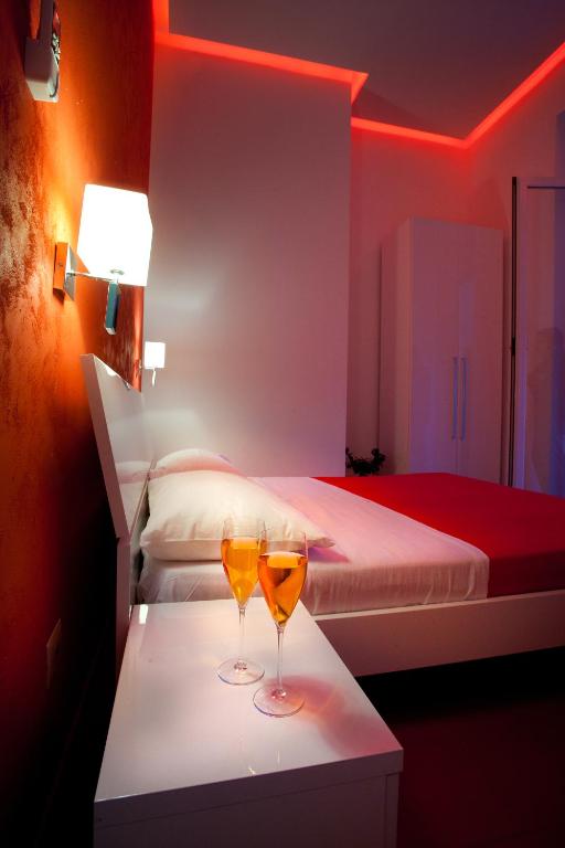 Postel nebo postele na pokoji v ubytování MergellinaResort