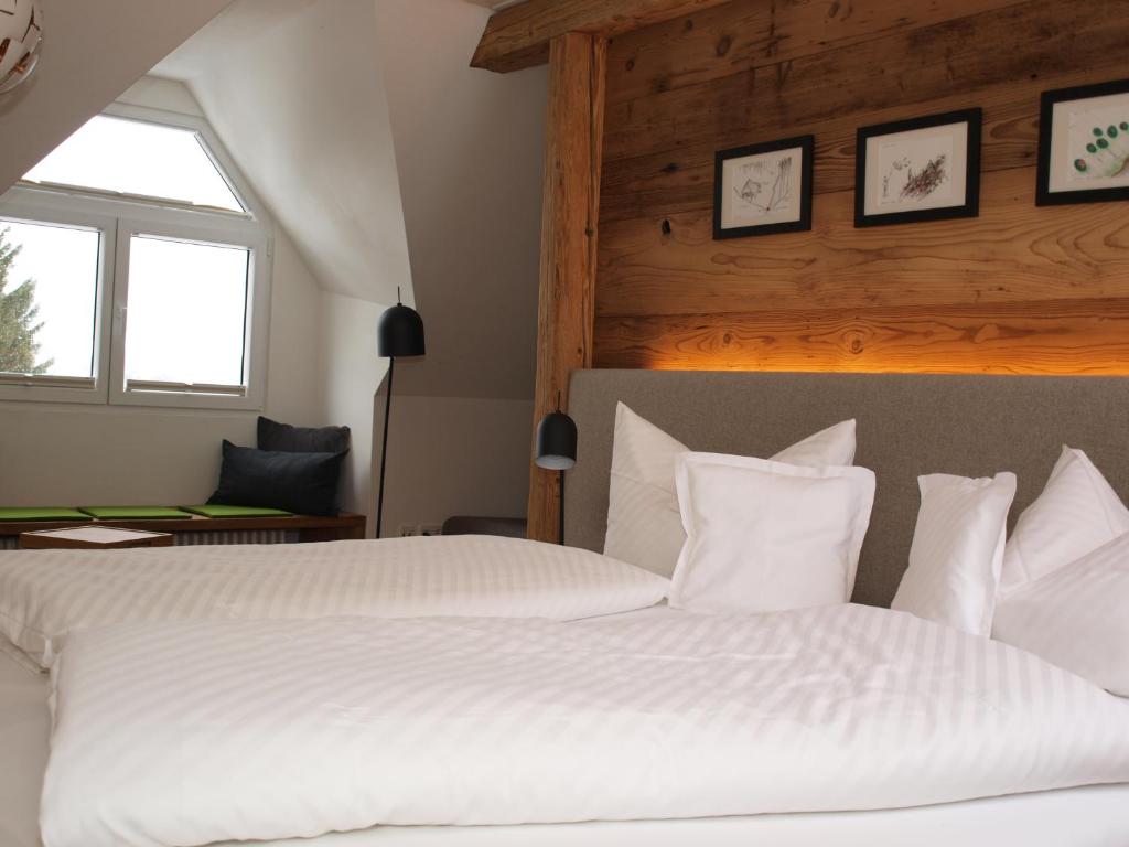 Postel nebo postele na pokoji v ubytování Hotel Restaurant Peterle