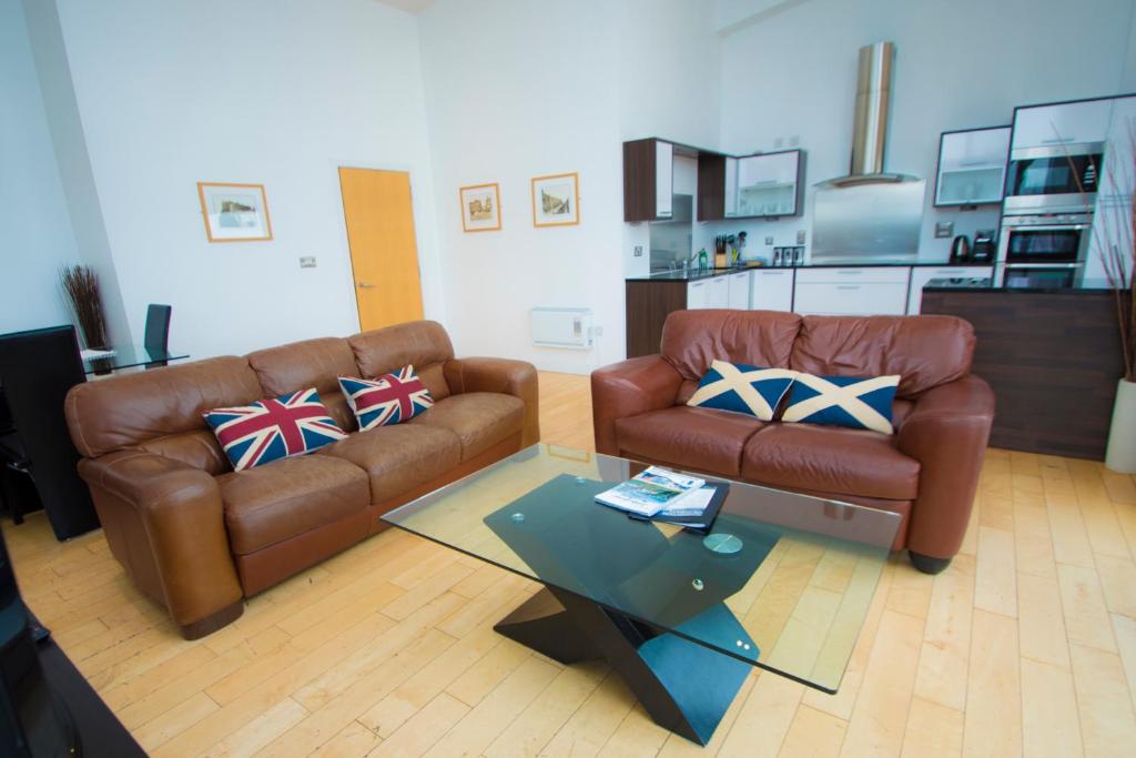 Kuchyň nebo kuchyňský kout v ubytování Ocean Serviced Apartments