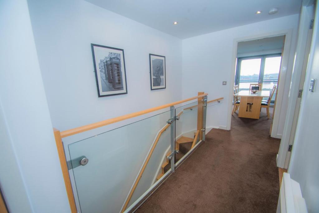 Postel nebo postele na pokoji v ubytování Ocean Serviced Apartments