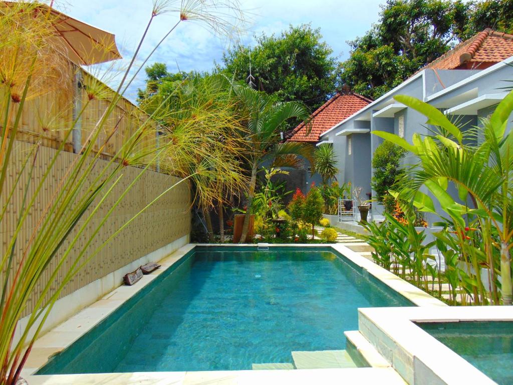 Πισίνα στο ή κοντά στο Batu Kandik Homestay