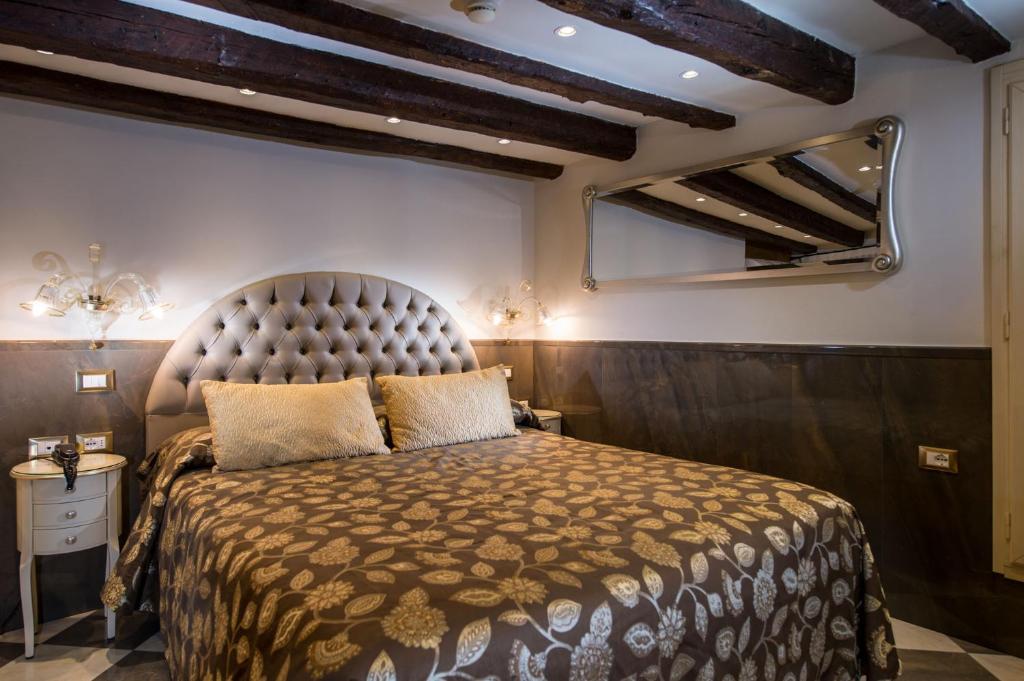 Cama ou camas em um quarto em Ca' Marinella