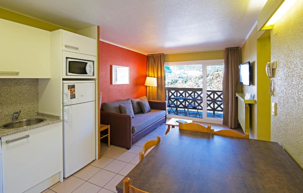 Kuchyň nebo kuchyňský kout v ubytování Apartaments Giberga