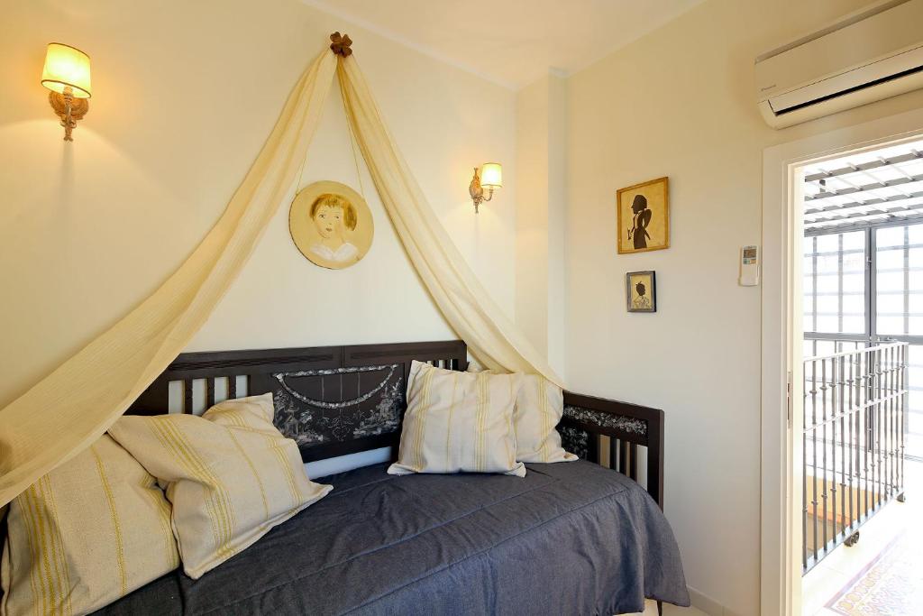 Postel nebo postele na pokoji v ubytování Veoapartment Quintana Terrace
