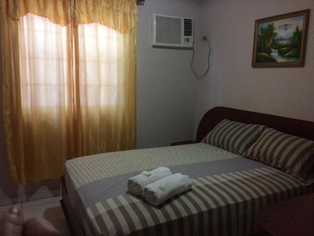 Postel nebo postele na pokoji v ubytování Residencial Turistico Cuba
