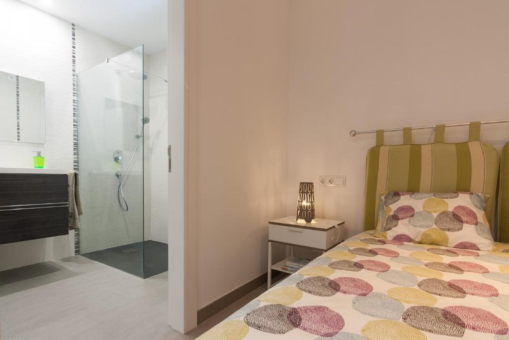 A bed or beds in a room at Llevant