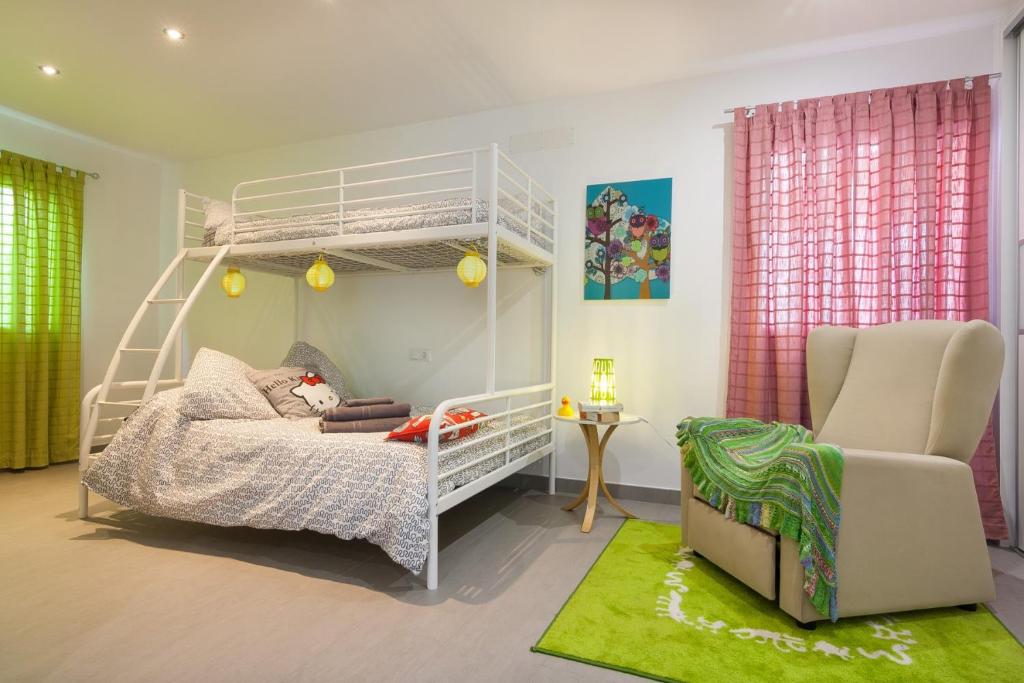 A bed or beds in a room at Llevant