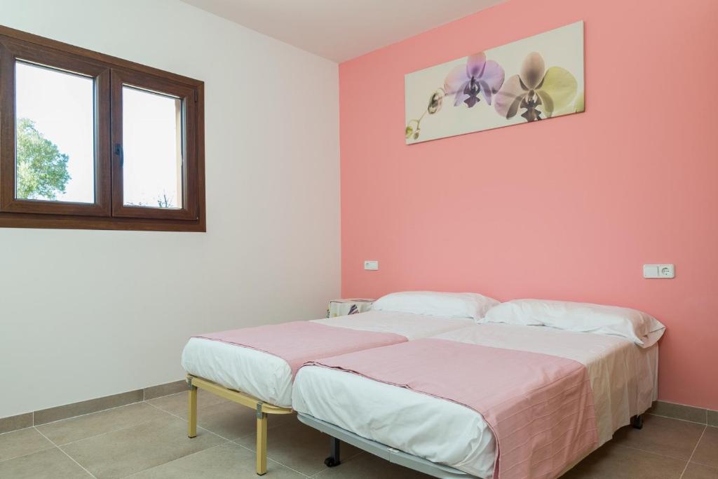 Postel nebo postele na pokoji v ubytování Can Pont