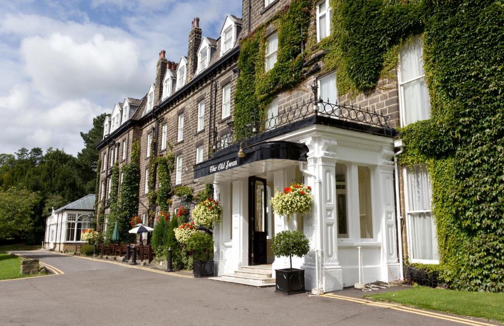 a building with flowers on the front of it at Old Swan Hotel in Harrogate