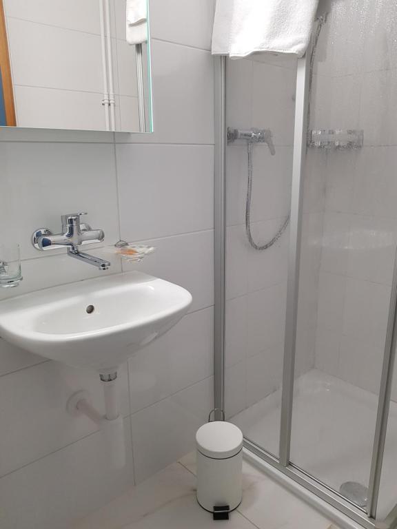 Koupelna v ubytování Hotel Elite