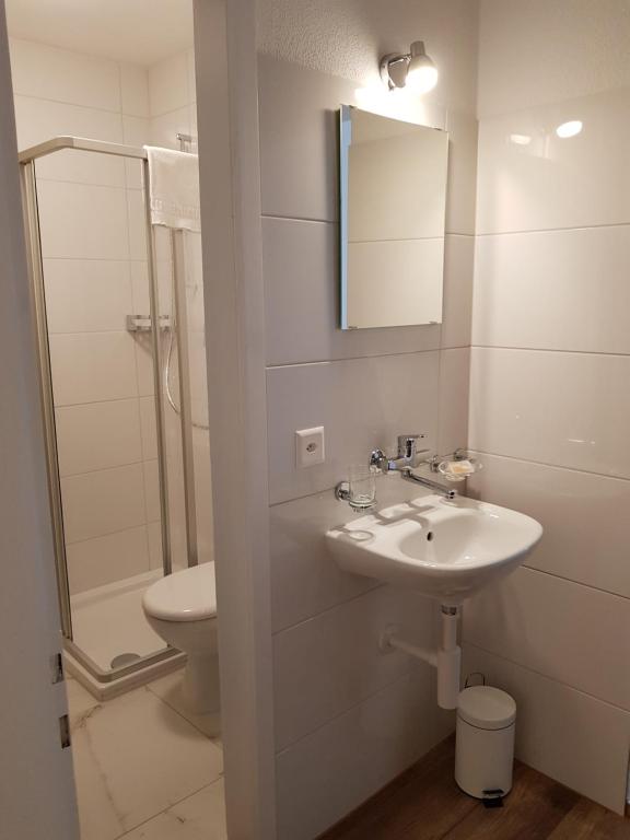 Koupelna v ubytování Hotel Elite