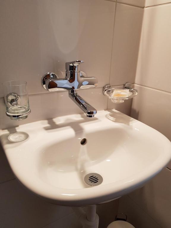Koupelna v ubytování Hotel Elite