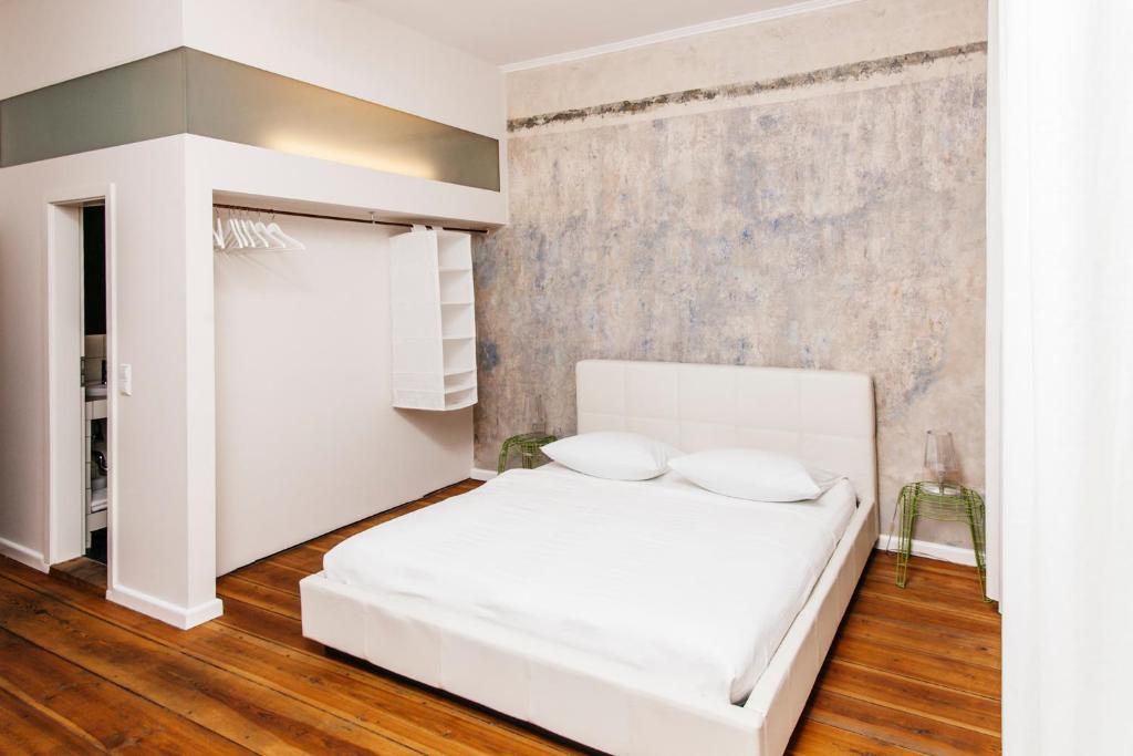 Postel nebo postele na pokoji v ubytování Jasper's Boutique Hotel