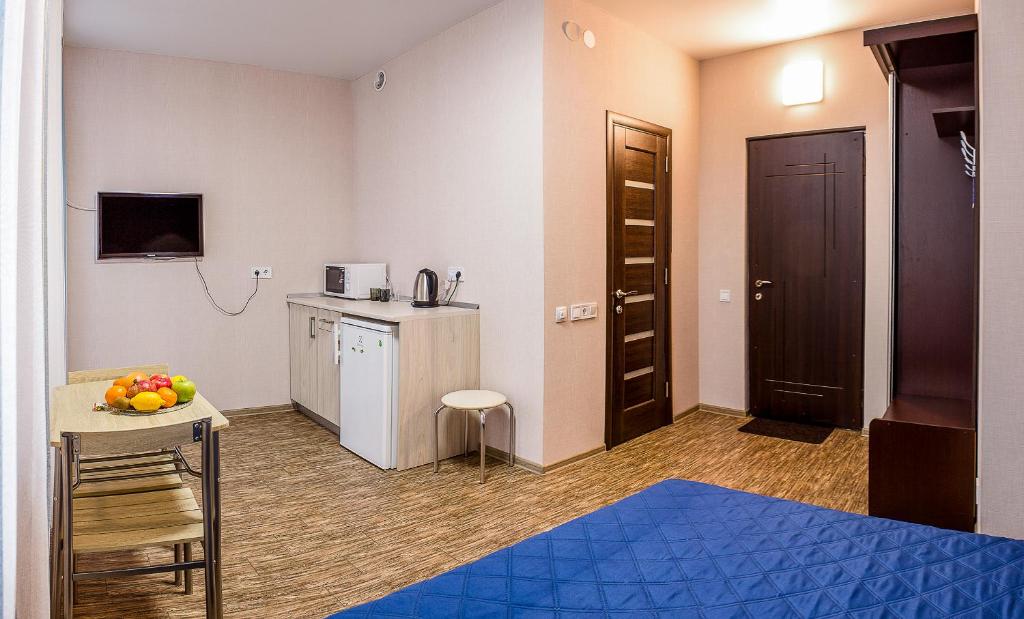 Kuchyň nebo kuchyňský kout v ubytování Apart Hotel Smart Studio