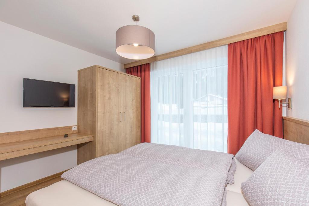 Posteľ alebo postele v izbe v ubytovaní Apart Ida