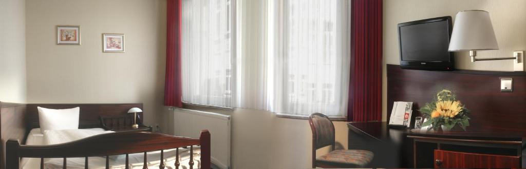 TV a/nebo společenská místnost v ubytování Hotel Marthahaus