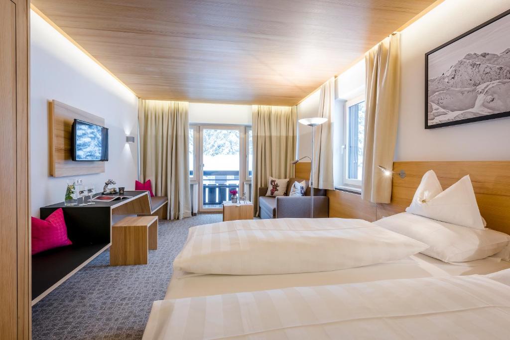 TV a/nebo společenská místnost v ubytování Cresta.Alpin.Sport.Hotel