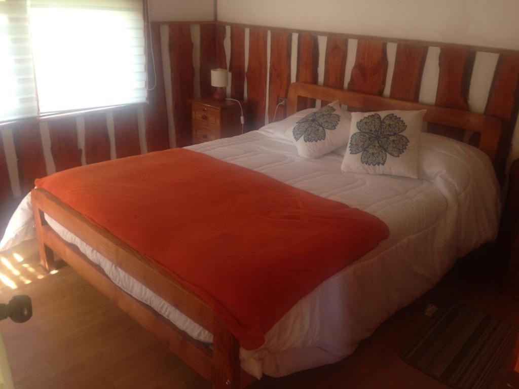 Postel nebo postele na pokoji v ubytování Lodge Palguin Alto