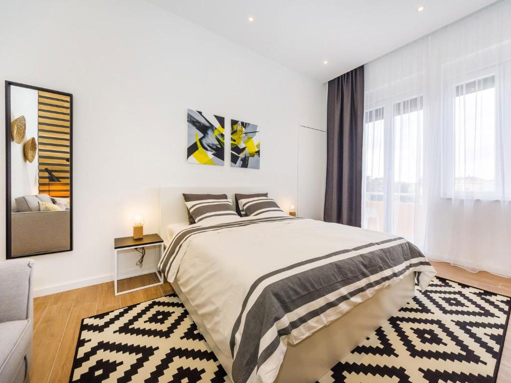 Posteľ alebo postele v izbe v ubytovaní Apartments Withlove Zadar