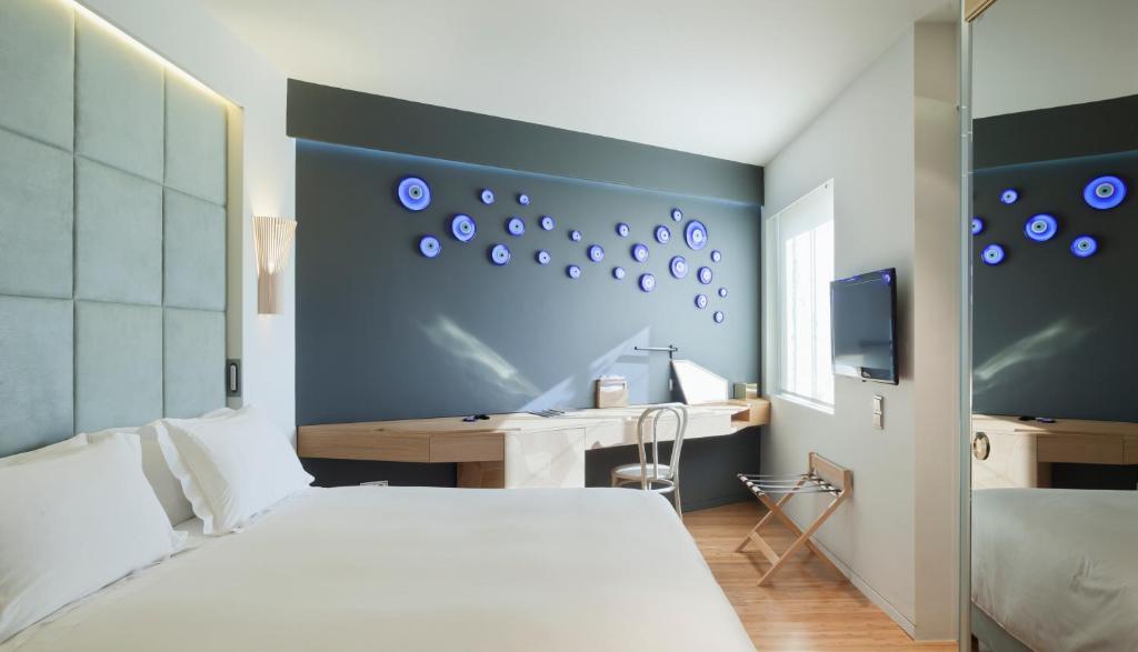 Postel nebo postele na pokoji v ubytování New Hotel