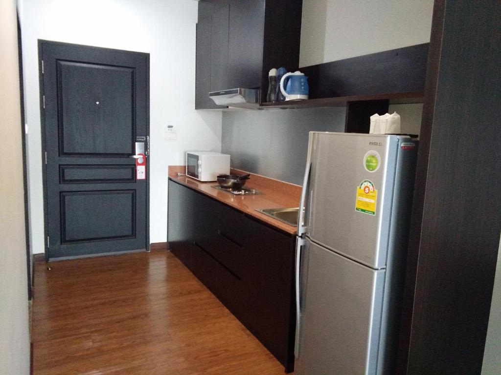 Kuchyň nebo kuchyňský kout v ubytování The Park 304 Executive Serviced Apartment