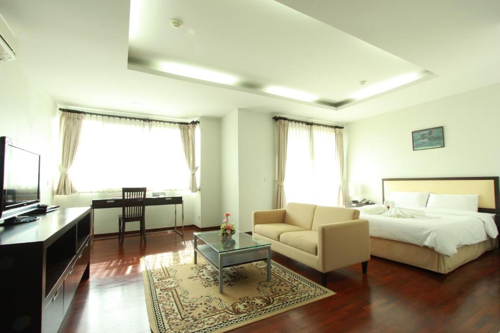 Postel nebo postele na pokoji v ubytování The Park 304 Executive Serviced Apartment