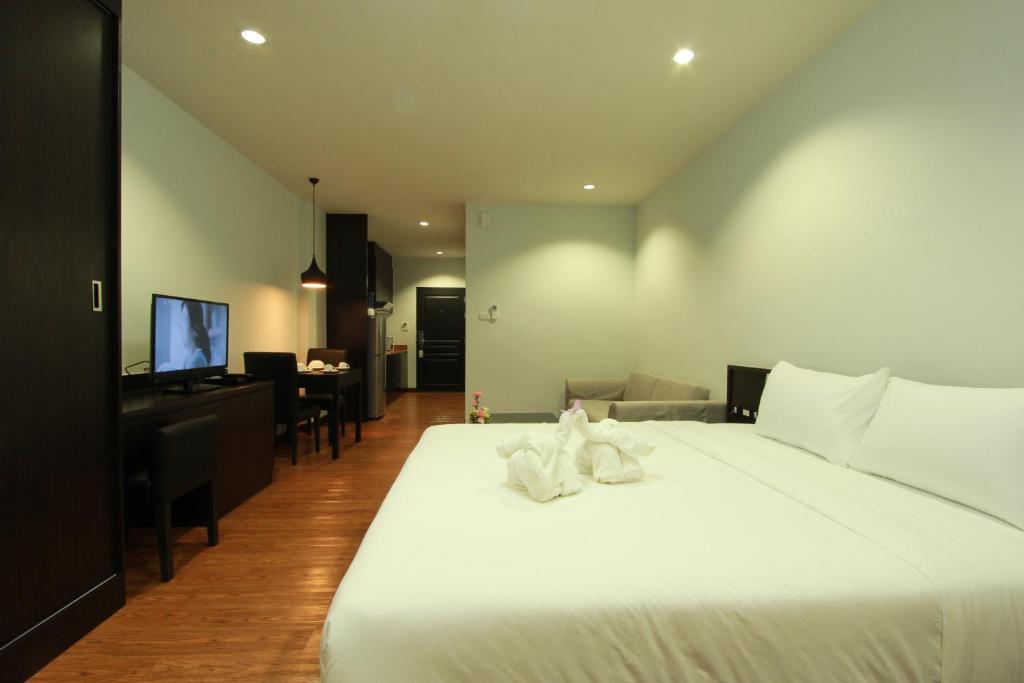 Postel nebo postele na pokoji v ubytování The Park 304 Executive Serviced Apartment