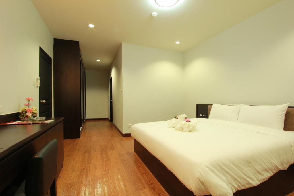 Postel nebo postele na pokoji v ubytování The Park 304 Executive Serviced Apartment