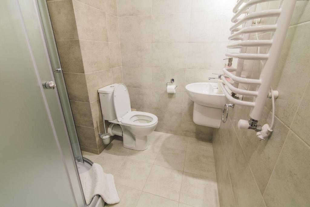 Koupelna v ubytování Zinedine Sport-Hotel
