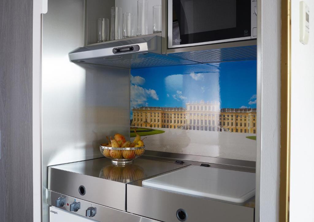 Kuchyň nebo kuchyňský kout v ubytování Living Hotel Kaiser Franz Joseph