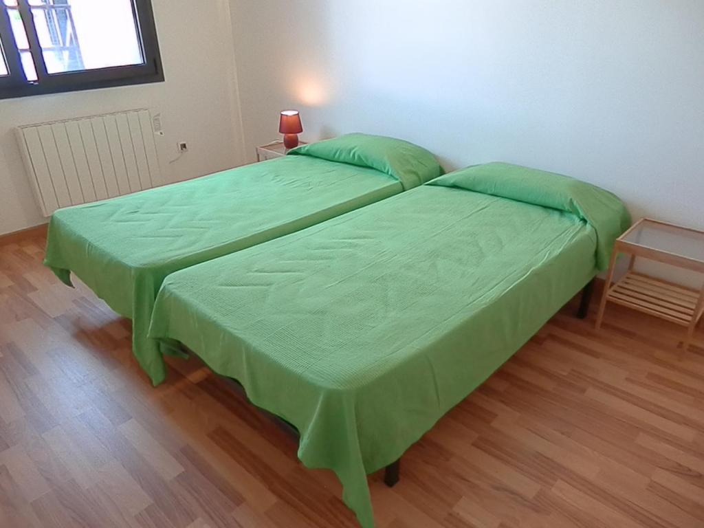 Postel nebo postele na pokoji v ubytování Apartamentos La Solana 3000