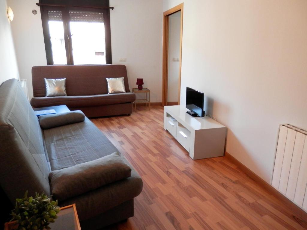 TV a/nebo společenská místnost v ubytování Apartamentos La Solana 3000