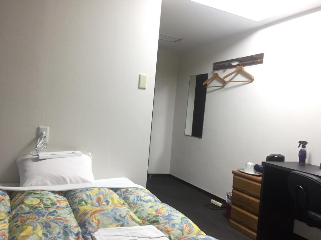Postel nebo postele na pokoji v ubytování Hotel Todai