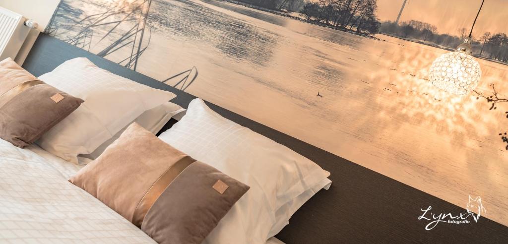 Postel nebo postele na pokoji v ubytování De Vesten Comfort Lodge