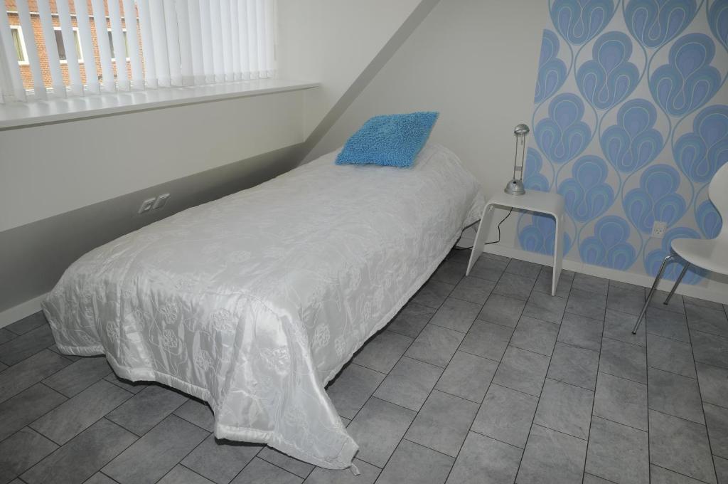 Postel nebo postele na pokoji v ubytování Hotel CoCo Aps