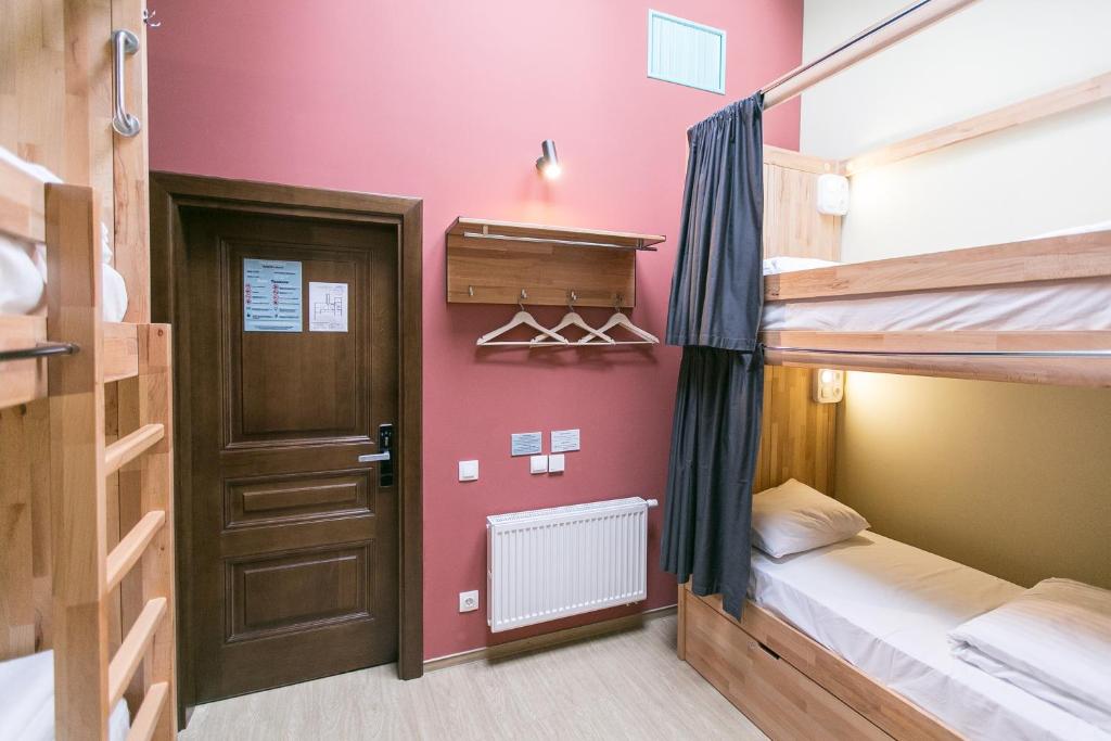 Postel nebo postele na pokoji v ubytování DREAM Hostel Lviv