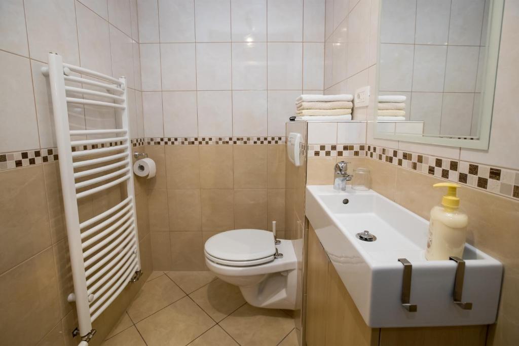 Koupelna v ubytování Apartments Markež