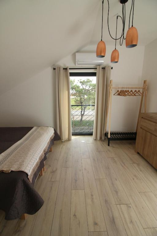 Postel nebo postele na pokoji v ubytování Lake Residence