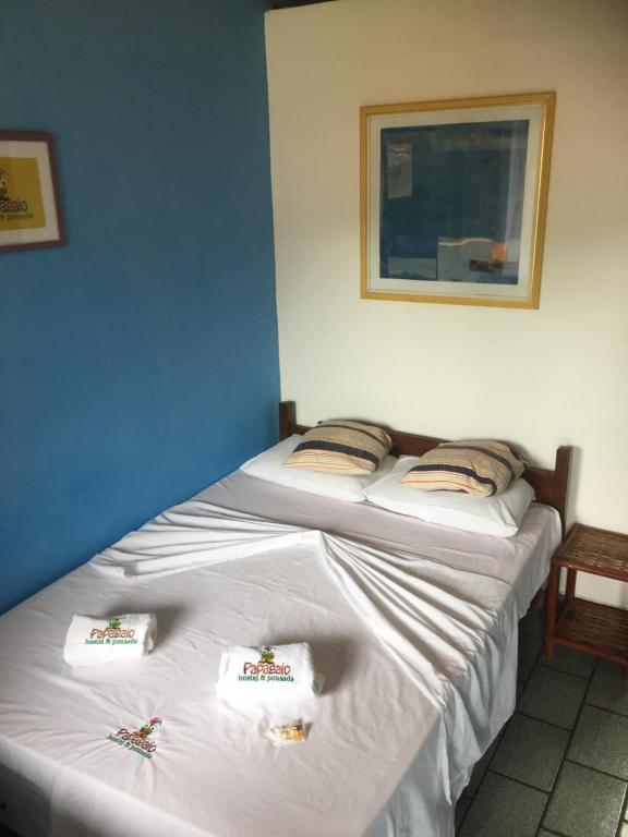 Voodi või voodid majutusasutuse Papagaio Hostel & Pousada toas