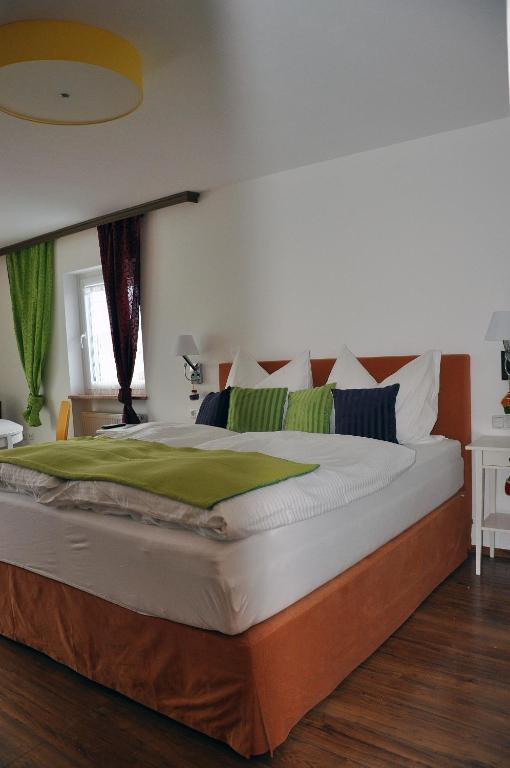 Postel nebo postele na pokoji v ubytování Gästehaus Anna